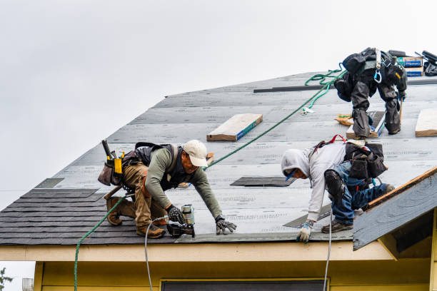 Professional Gutter Installation technician working in Massapequa, NY